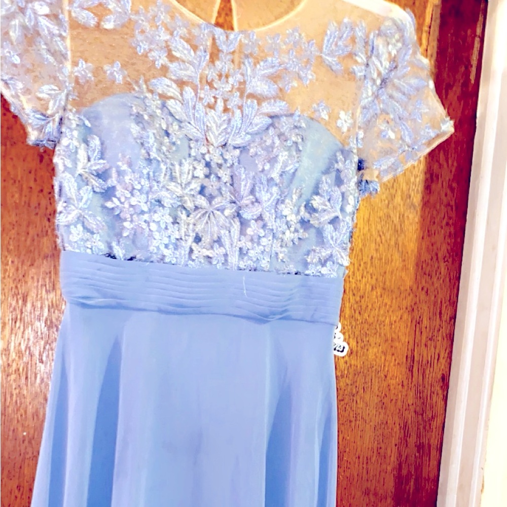 This dress is a little blue long flowy lacy top dress very beautiful